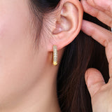 The Pavé Huggie Hoop Earrings