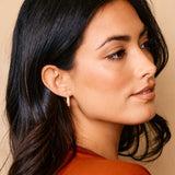The Pavé Huggie Hoop Earrings