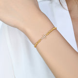 Gold Beaded Cross Stretch Bracelet